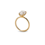 Angled view of Bloom ring highlighting the raised moissanite setting and minimal band design