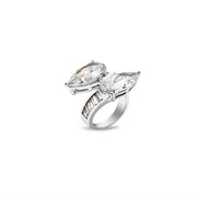 Twin pear-cut moissanite ring with vertical baguette accents on the band, angled side view
