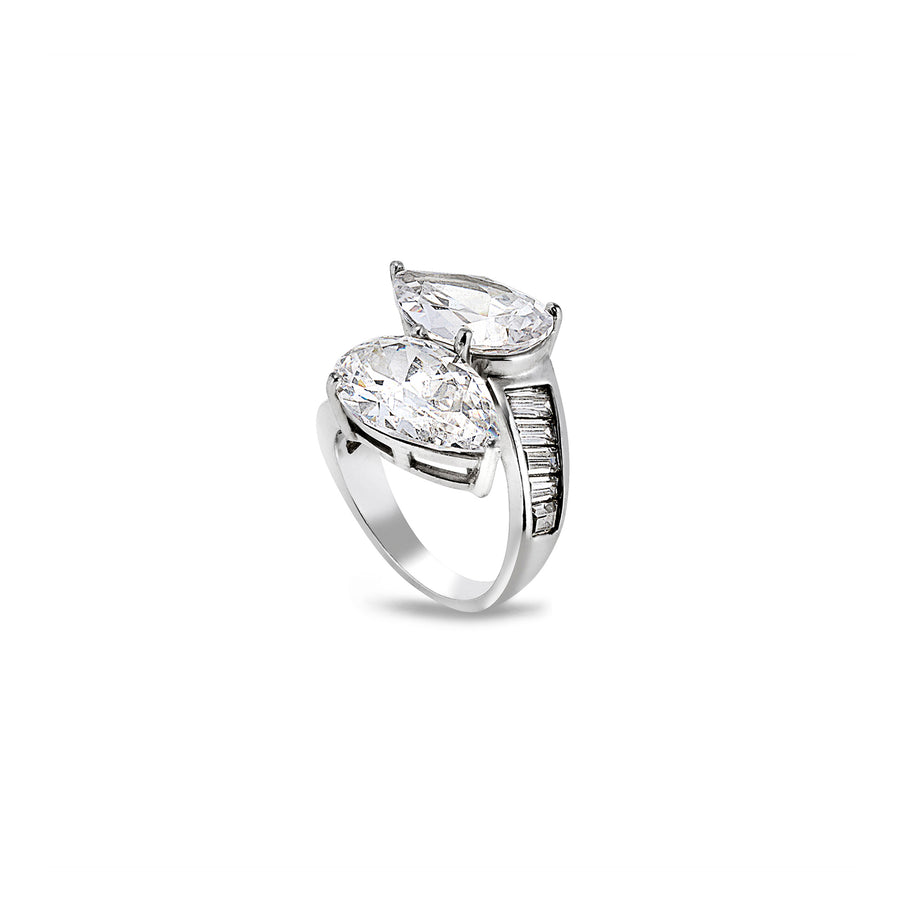 Bold wrap-style ring with two large pear moissanite stones and baguette detailing, side perspective