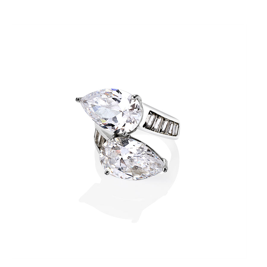 Top-down view of Carmalita ring showing twin pear stones and baguette inlay along the band