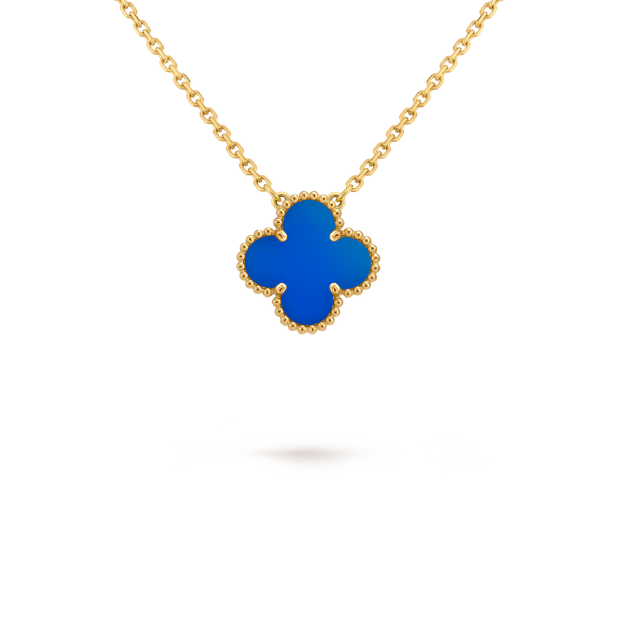 Gold necklace with a blue clover-shaped pendant on a black background