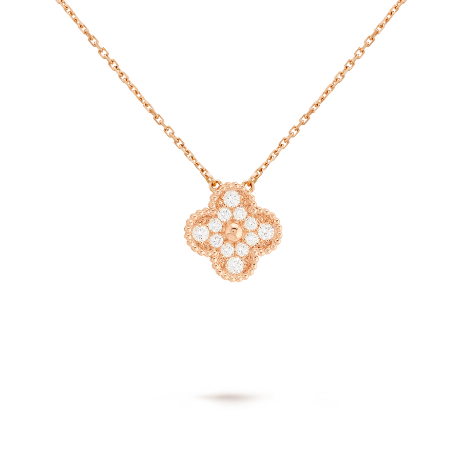 Rose gold necklace with a diamond pendant on a clear background