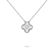 Diamond necklace with a clover-shaped pendant on a clear background