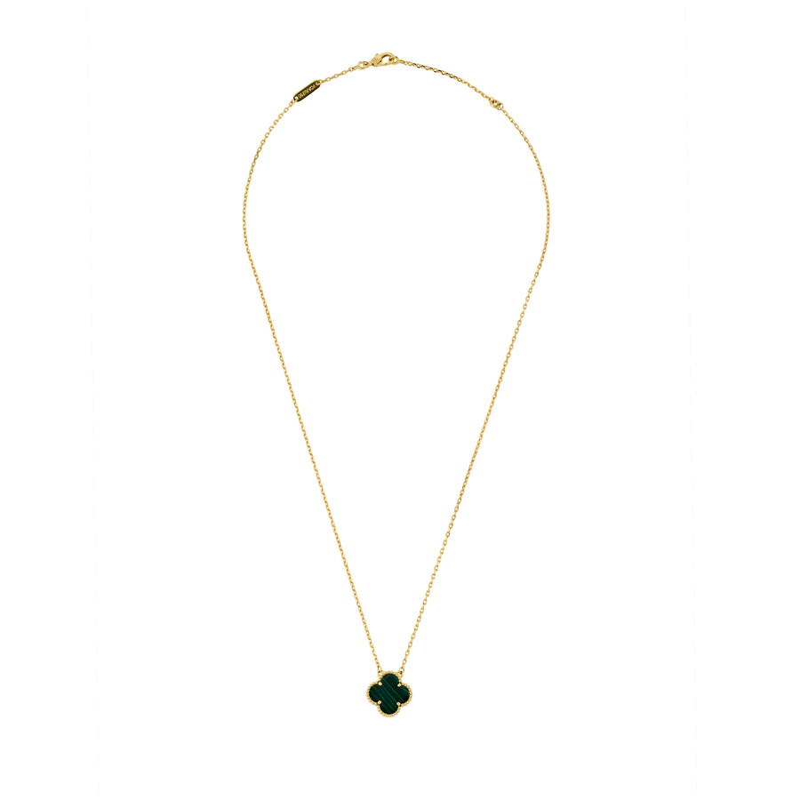 Mini Clover Pendant necklace with green clover charm and gold chain on white background