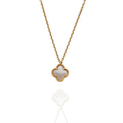 Close-up showing clover-shaped pendant with luminous Mother of Pearl and delicate gold detailing