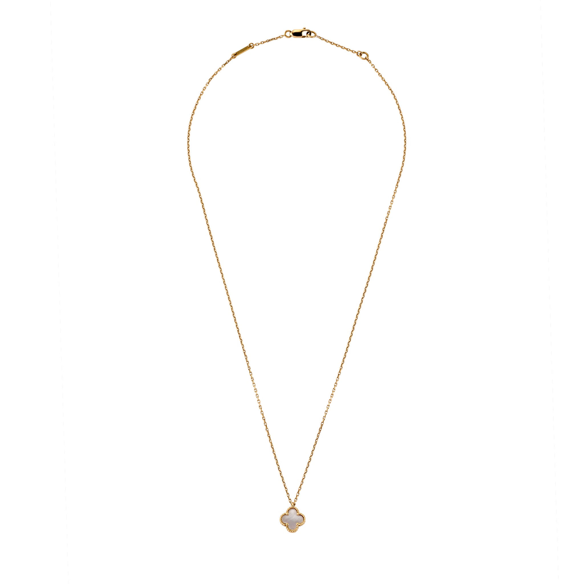 Full view of gold necklace featuring a clover pendant with Mother of Pearl inlay and beaded edge