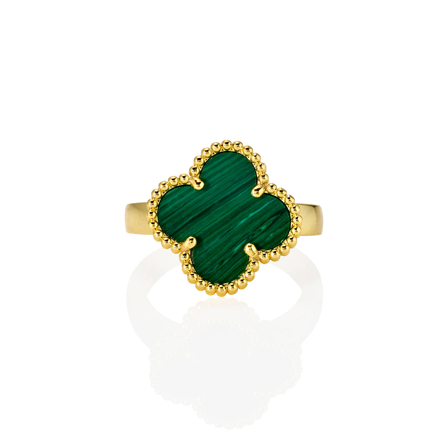 Top view of clover ring with malachite-style green inlay and gold beaded edge