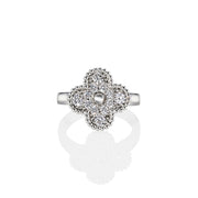 Side view of silver ring with pavé-set moissanite four-leaf clover and beaded trim