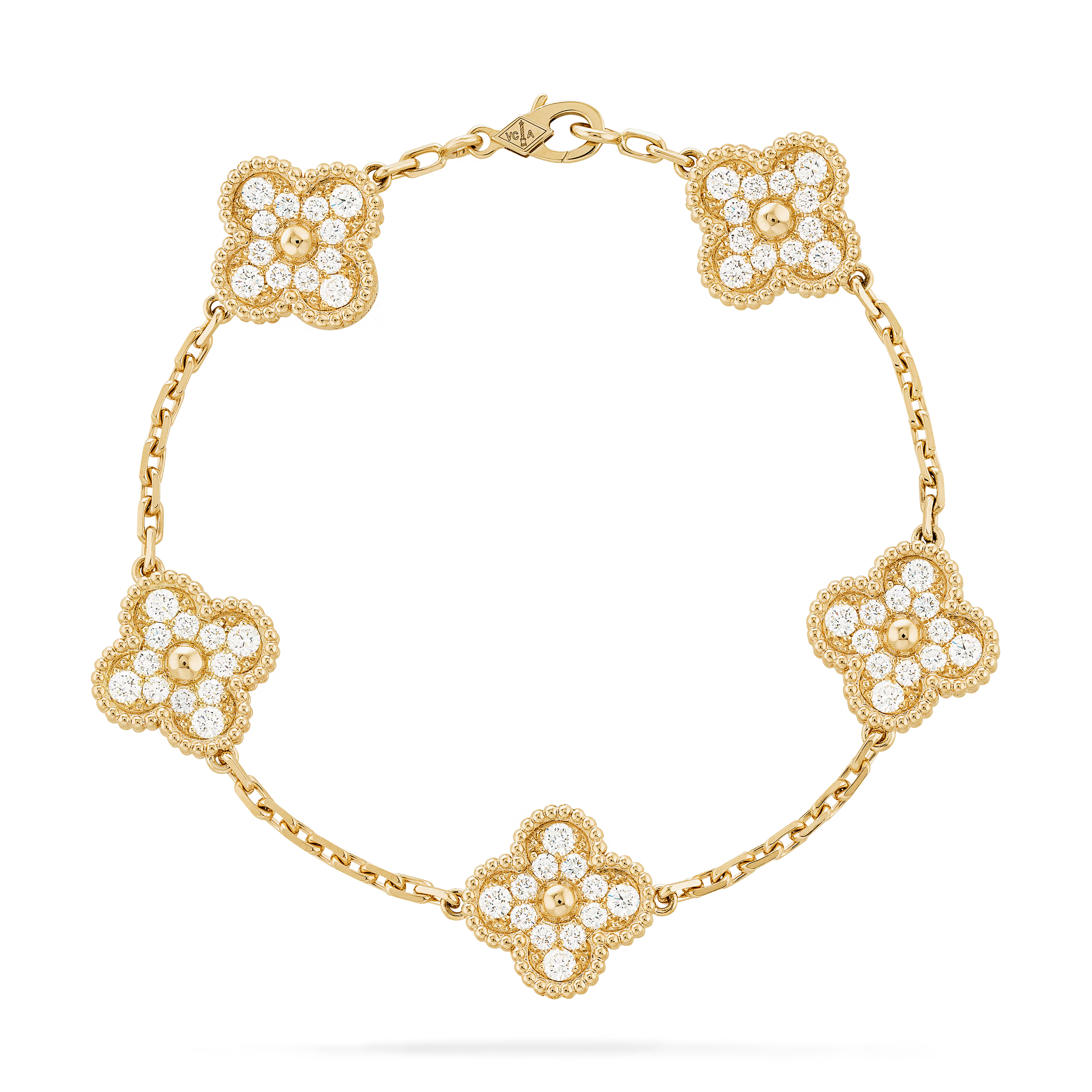 Gold bracelet with floral designs and clear stones on a black background