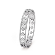 Silver ring with floral designs on a transparent background