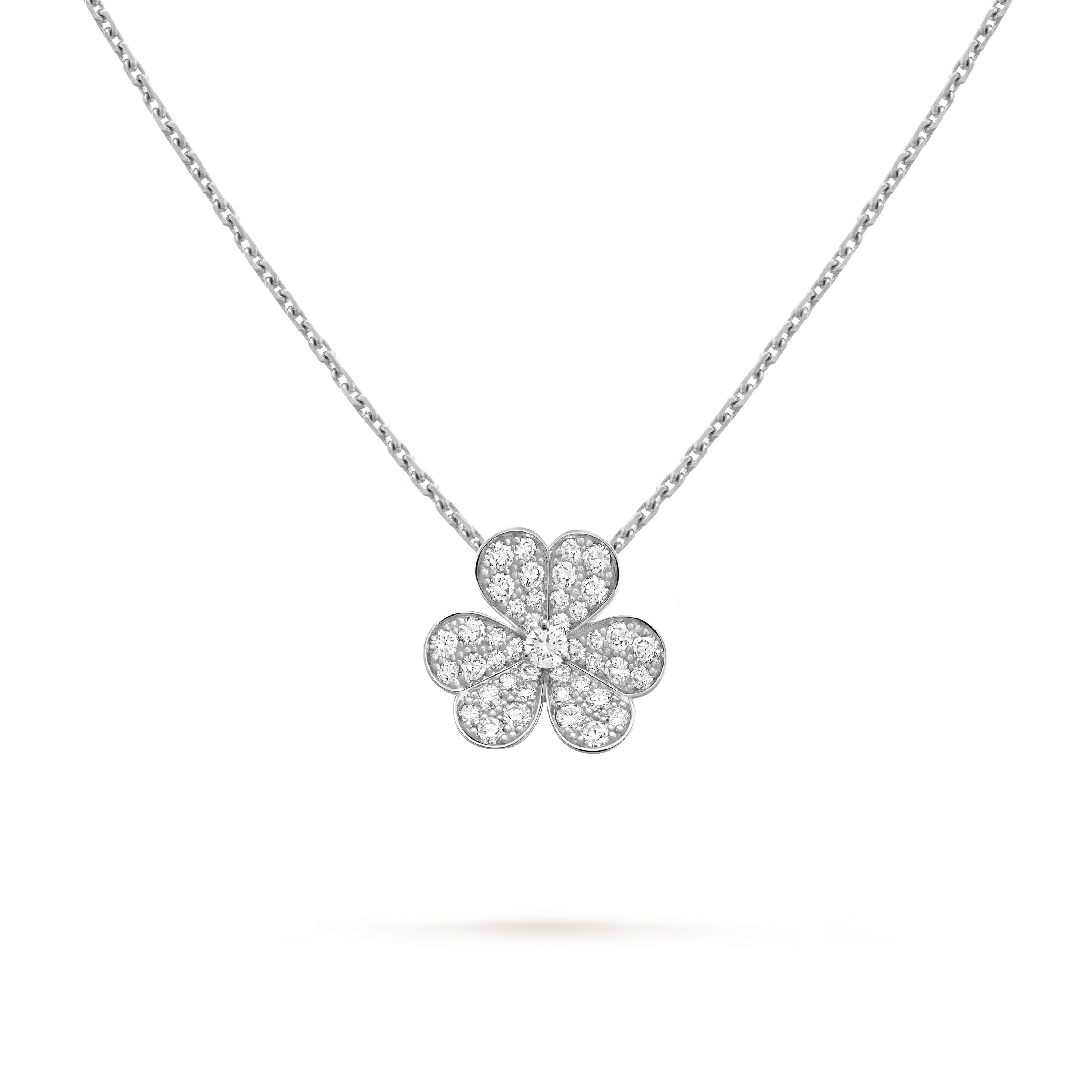Silver four-leaf clover pendant necklace on a clear background
