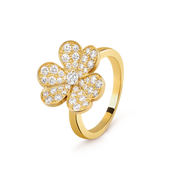 Gold ring with diamond flower design on a transparent background