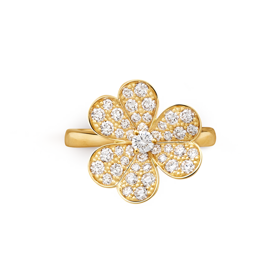 Gold ring with diamond-studded four-leaf clover design on a white background