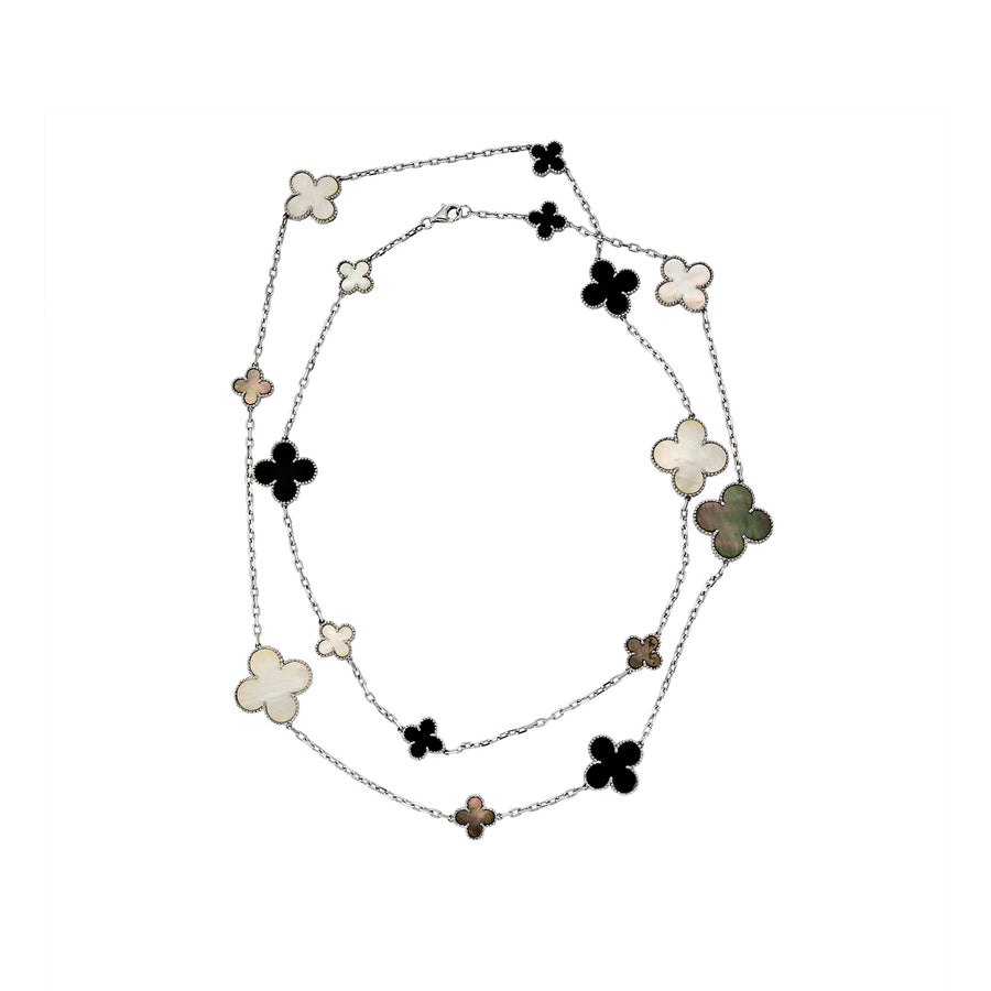 Long Clover necklace with alternating four-leaf motifs in black, white, and green inlay with delicate beaded borders