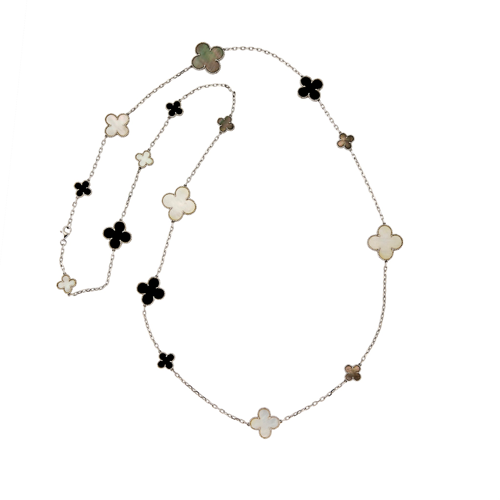 Full view of Long Clover station necklace showcasing multi-coloured inlay clovers on a fine chain