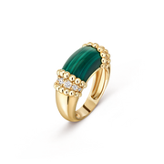 Gold ring with a green gemstone on a transparent background