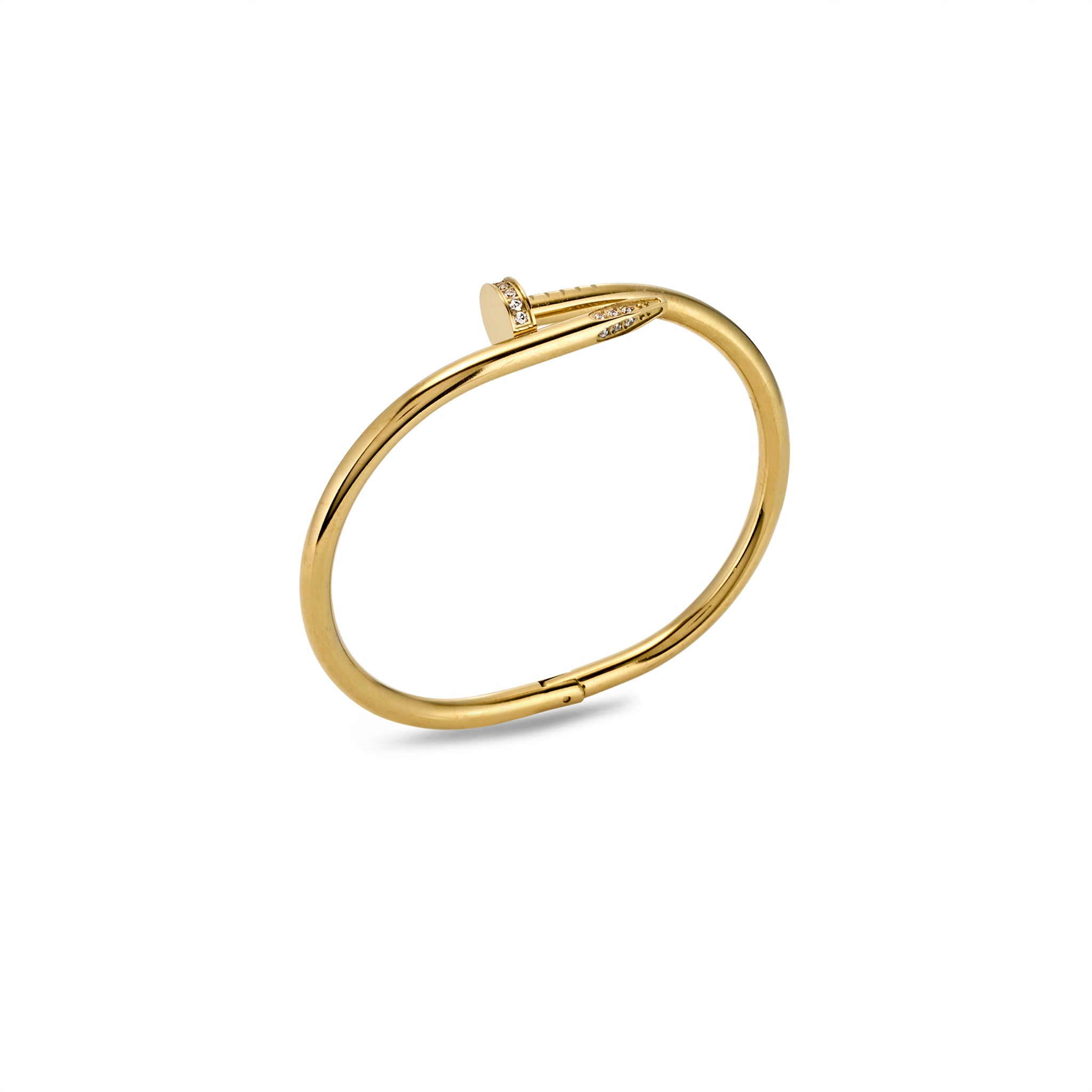 Angled top view of nail-style gold bracelet showing sleek curve and sparkling accents