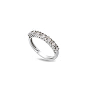 Angled view of Natasha ring with pavé-set moissanite stones in a half eternity design