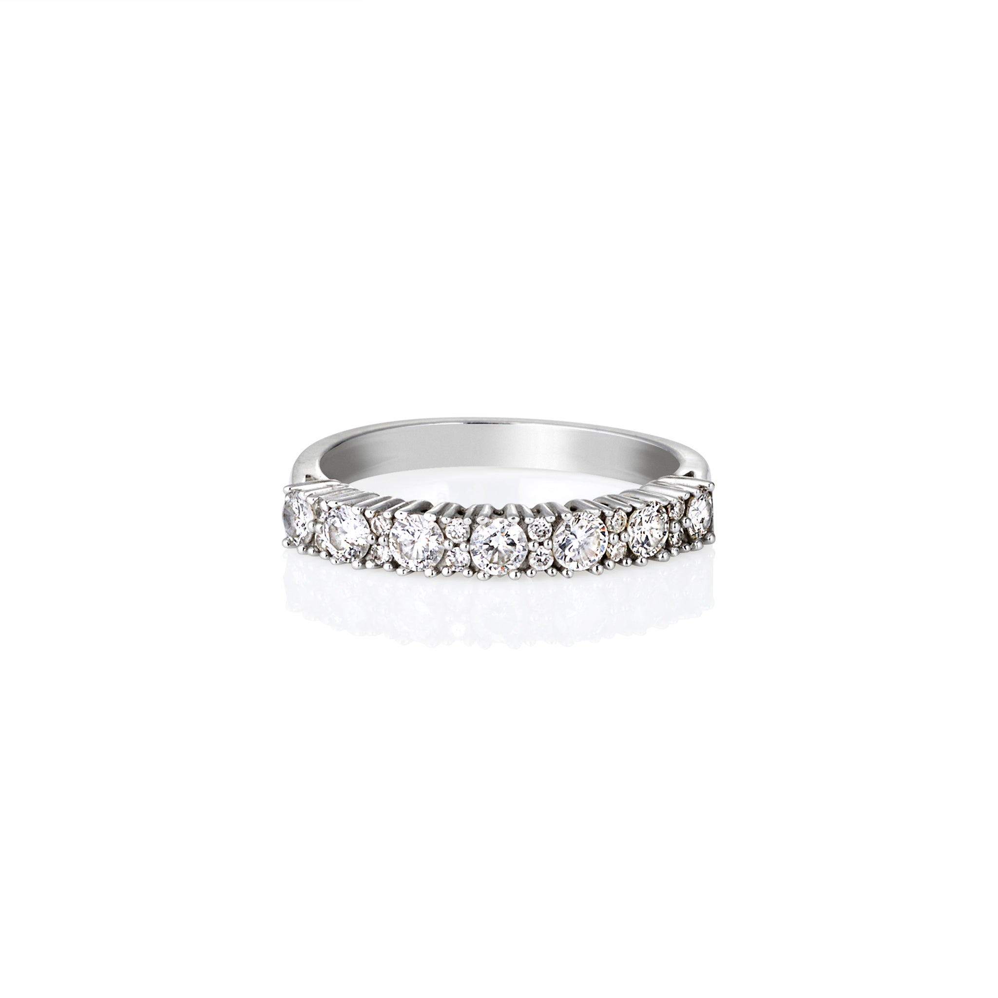 Side view of slim moissanite half eternity ring with round pavé stones, perfect for stacking.