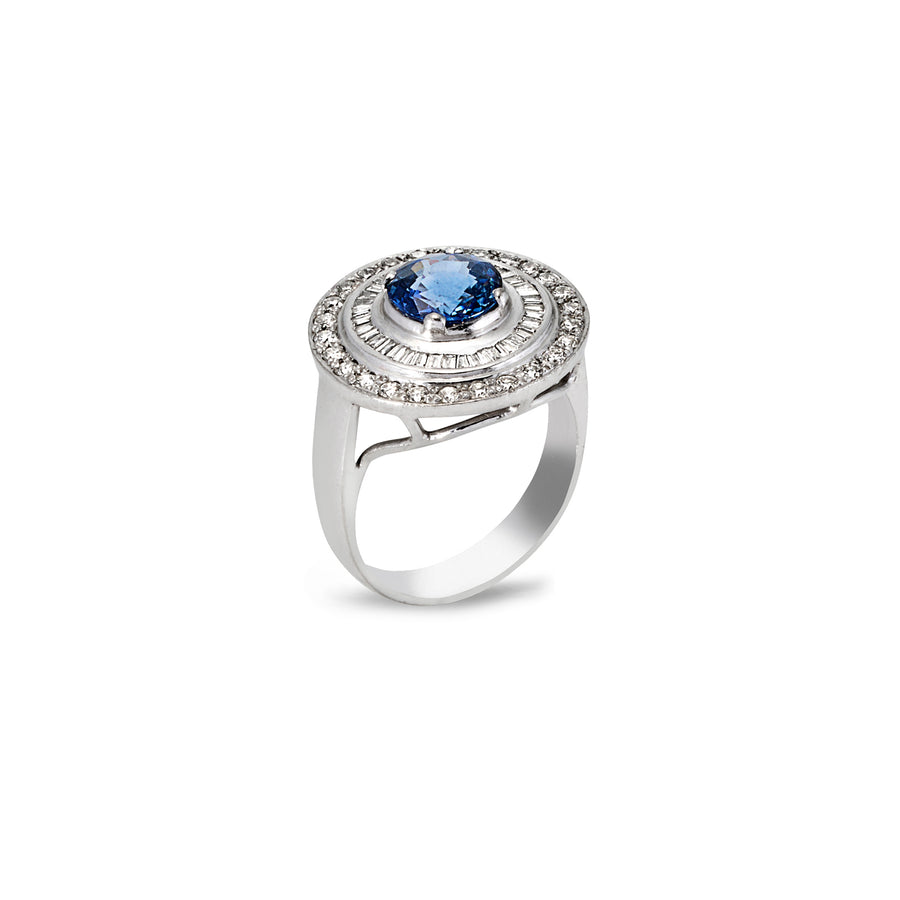 Heirloom-inspired sapphire and moissanite halo ring with split-shoulder band