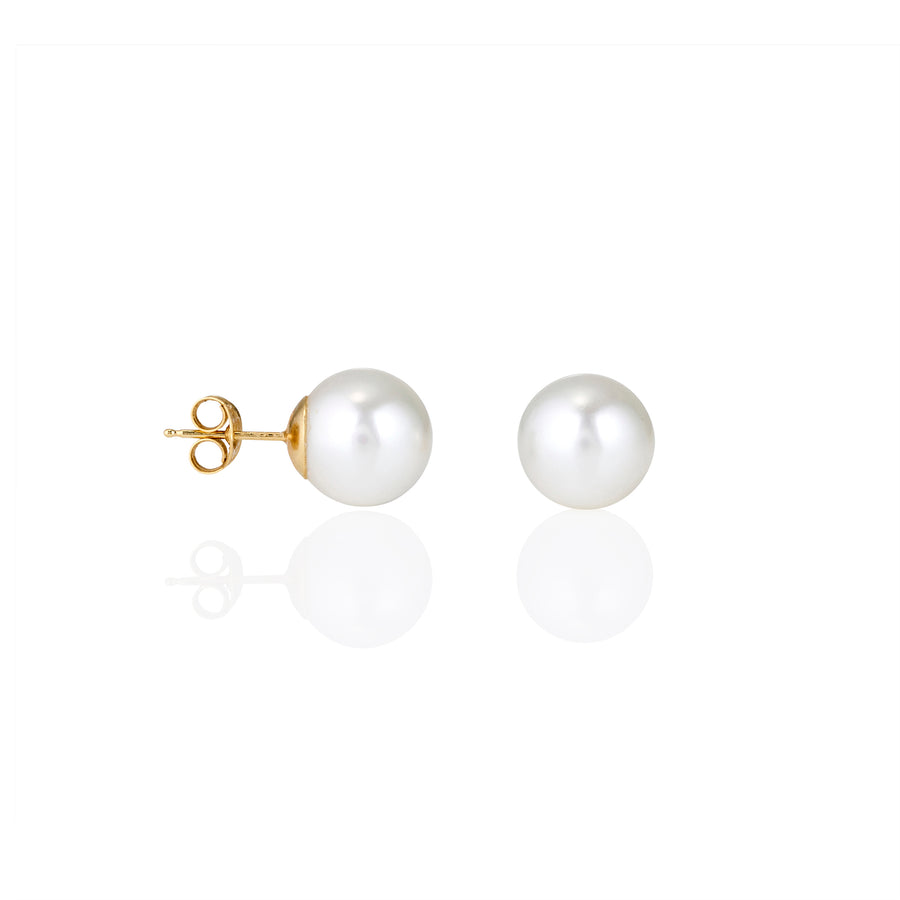 Classic pearl earrings showing smooth, lustrous surface and minimal setting