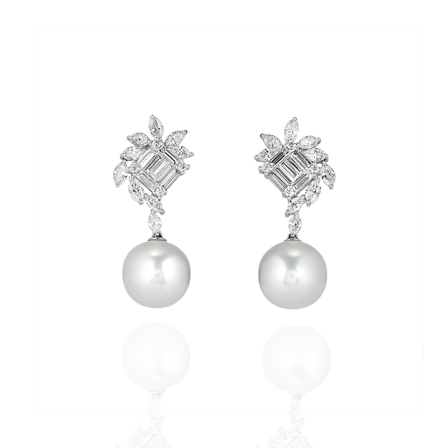 Front view of pearl drop earrings with moissanite cluster tops and round pearl drops