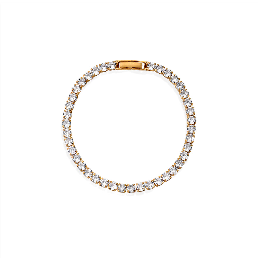 Top-down view of tennis bracelet with gold setting and continuous round moissanite stones