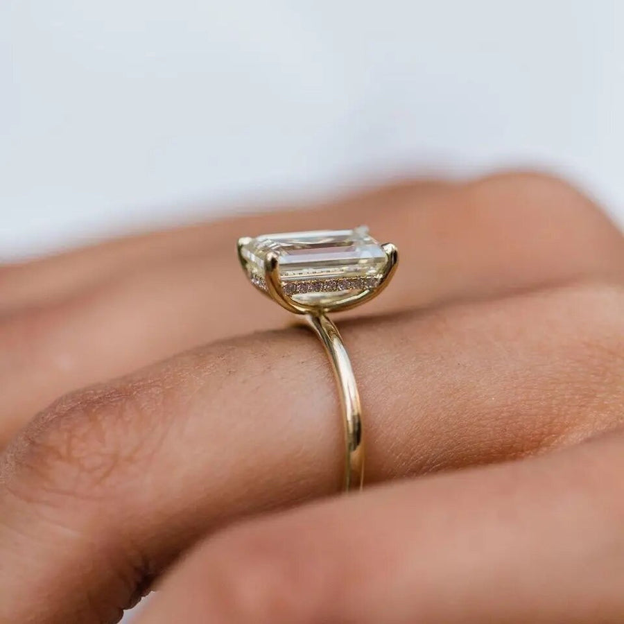 Diana ring worn on model’s hand with elegant nail styling