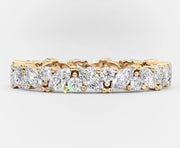 Jackie marquise moissanite eternity ring in yellow gold setting
