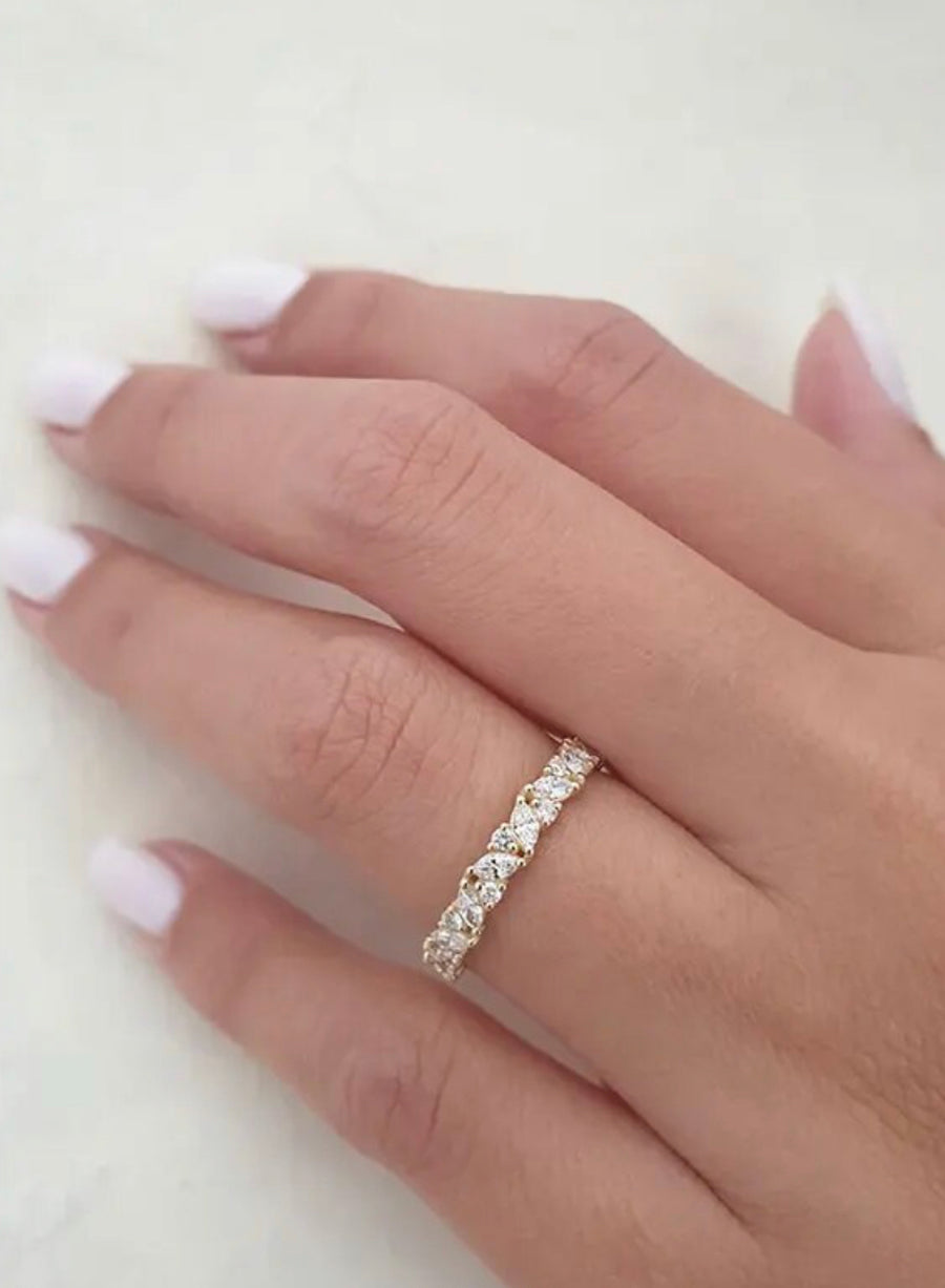 Side angle of Jackie eternity ring showing brilliant sparkle