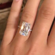 Close-up of Sage ring showing emerald cut centre and pave band
