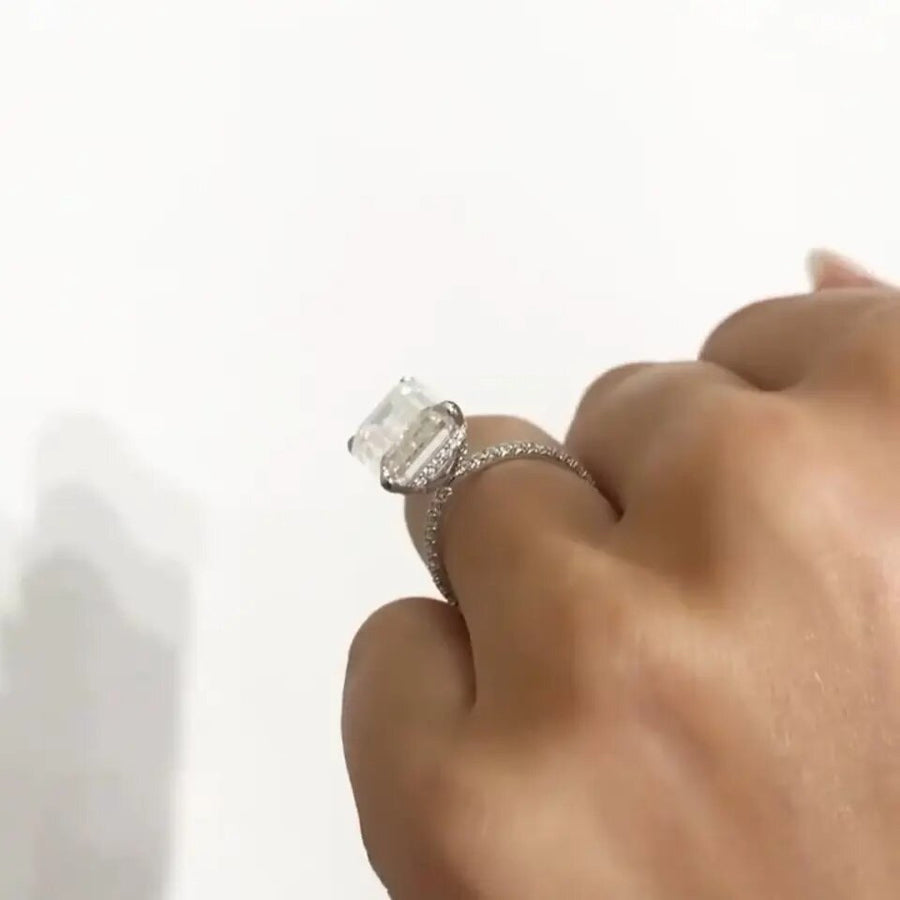Gold Sage ring being placed on finger – radiant view