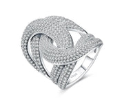 Twist Moissanite ring in silver with pavé-set stones – front angle