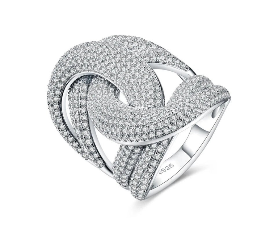 Twist Moissanite ring in silver with pavé-set stones – front angle