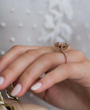 Close-up of 8ct crushed ice moissanite ring in warm champagne hue