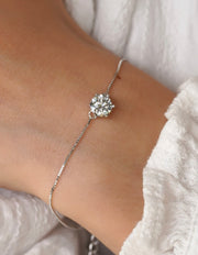 Close-up showing clasp detail on the dainty Moissanite bracelet.