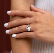 Close-up of Eleanor engagement ring being worn