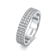 A classic 3 row Moissanite pave band ring with 1.5mm full row Moissanites, set in a solid 925 silver, plated in 18k white gold.