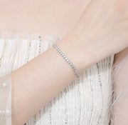 2mm Round Bezel Moissanite Tennis Bracelet – 9K Gold & Silver