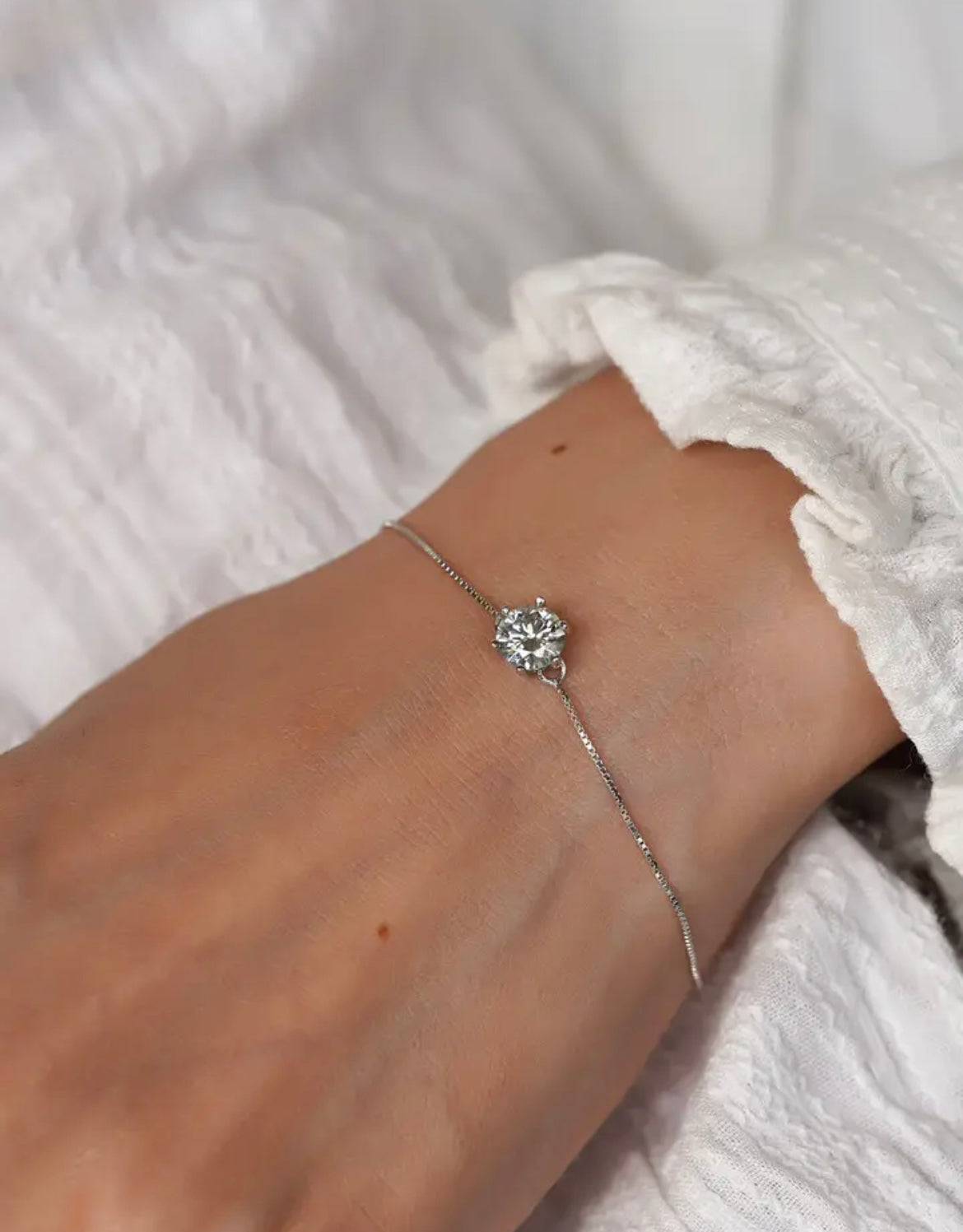 Close-up side profile of the Moissanite solitaire bracelet.