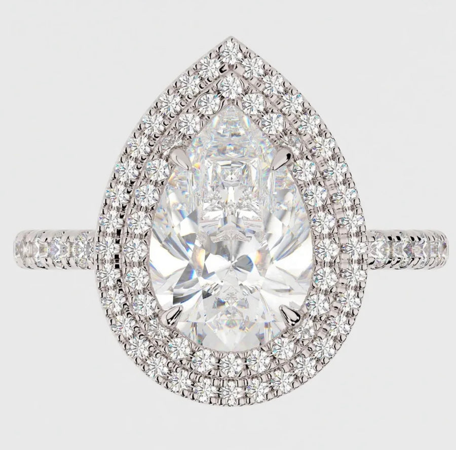 Front view of Portia ring showcasing pear-cut Moissanite and double halo detail