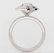 Side profile of Portia ring with 3ct pear-cut Moissanite and double halo setting