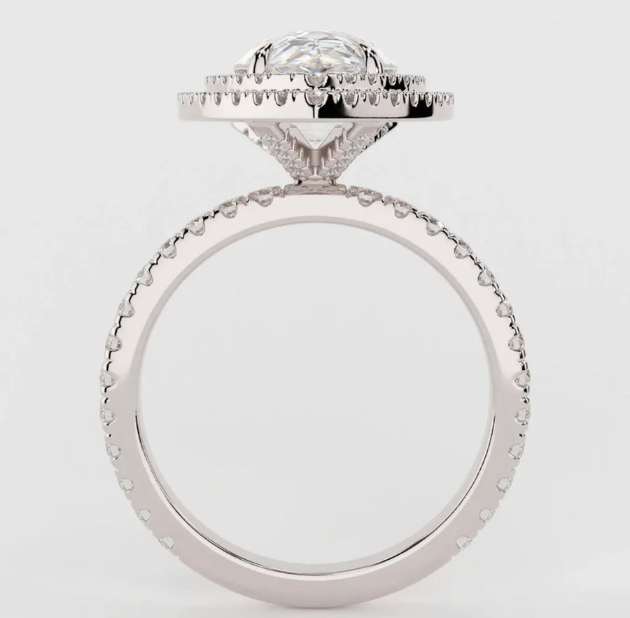 Side profile of Portia ring with 3ct pear-cut Moissanite and double halo setting