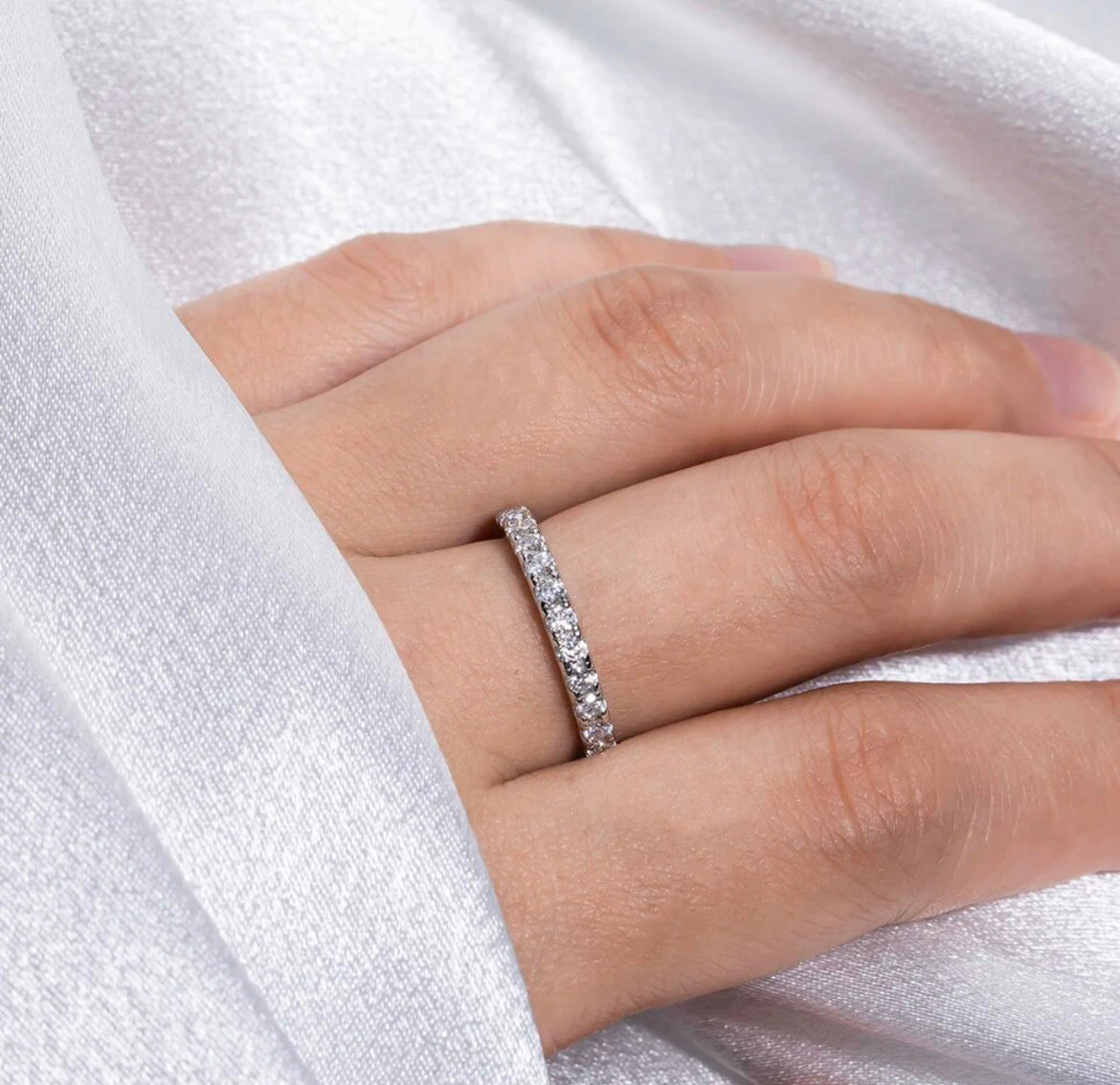 Model wearing Rebecca wedding band in white gold