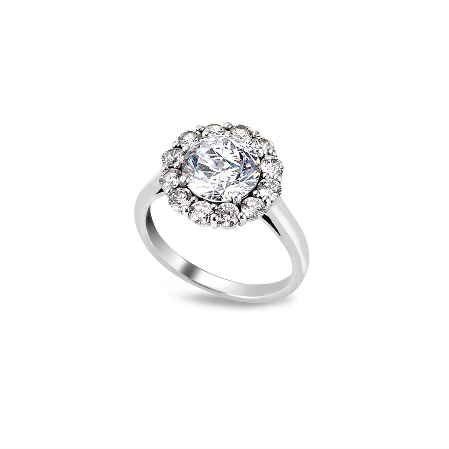 Angled view of moissanite halo ring with a brilliant round-cut centre stone in a classic solitaire setting