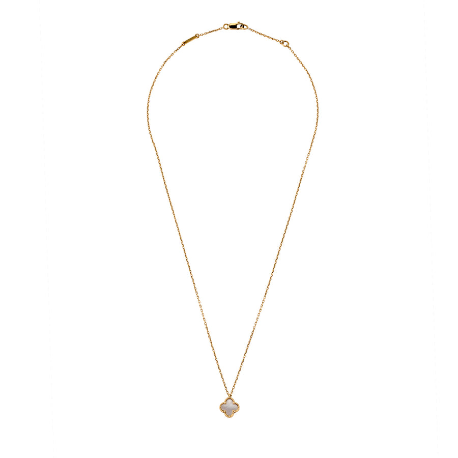 Full view of gold necklace featuring a clover pendant with Mother of Pearl inlay and beaded edge