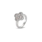 Close-up of moissanite clover ring showing sparkle and raised floral setting
