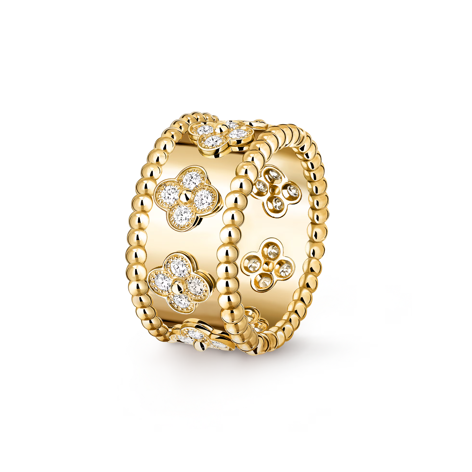 Gold ring with floral designs and clear stones on a white background