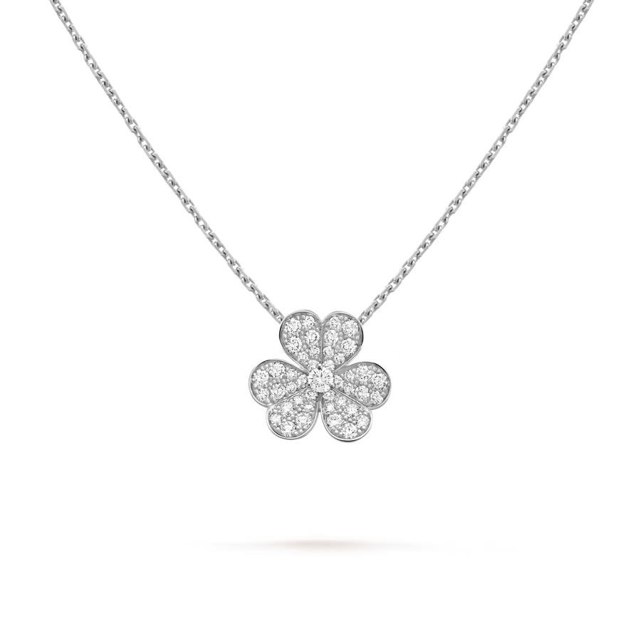 Silver four-leaf clover pendant necklace on a clear background