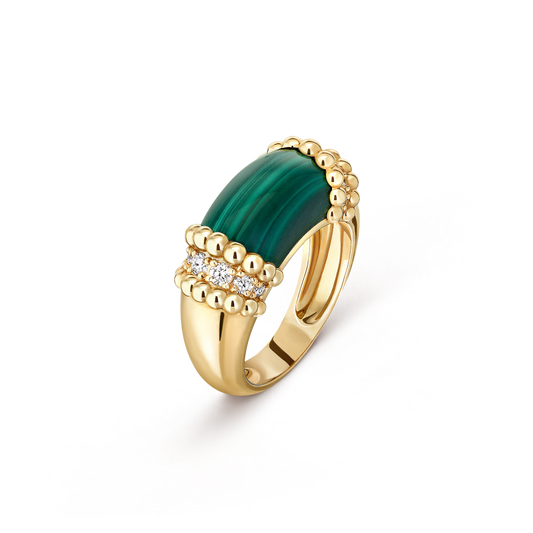 Gold ring with a green gemstone on a transparent background